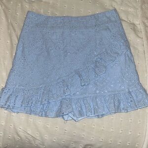 Blue eyelet mini skirt